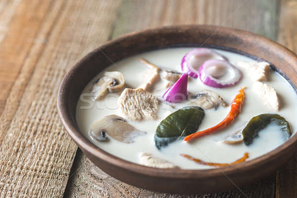 Bowl of thai tom kha kai soup Stock photo © Alex9500