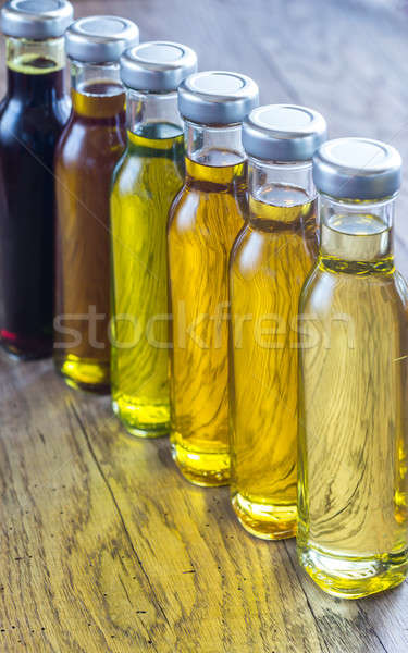 Bottles with different kinds of vegetable oil Stock photo © Alex9500