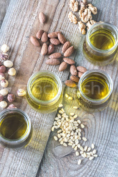 Glass jars with different kinds of nut oil Stock photo © Alex9500