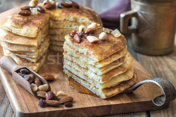 Stack of pancakes with butter and maple syrup Stock photo © Alex9500