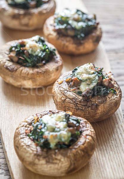 Baked mushrooms stuffed with spinach and cheese Stock photo © Alex9500