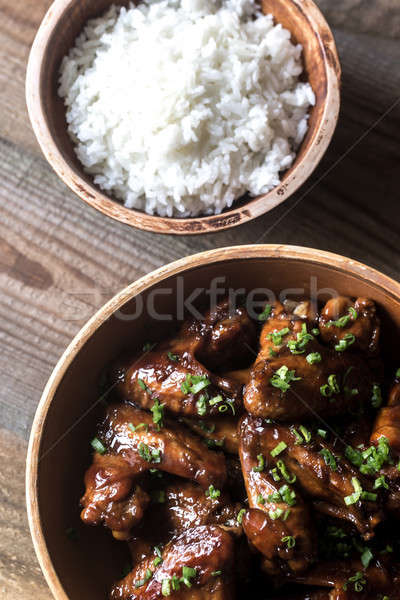Bowl of teriyaki chicken wings with rice Stock photo © Alex9500