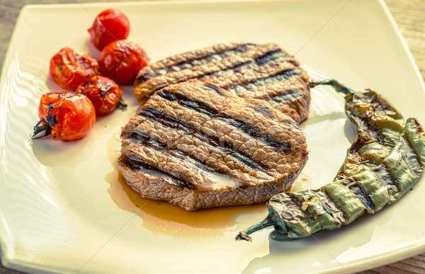 Beef steaks on the white square plate Stock photo © Alex9500