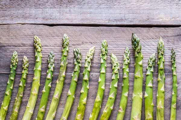 Fresh asparagus on the wooden background Stock photo © Alex9500