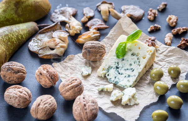 Blue cheese with walnuts, oyster mushrooms and green olives Stock photo © Alex9500