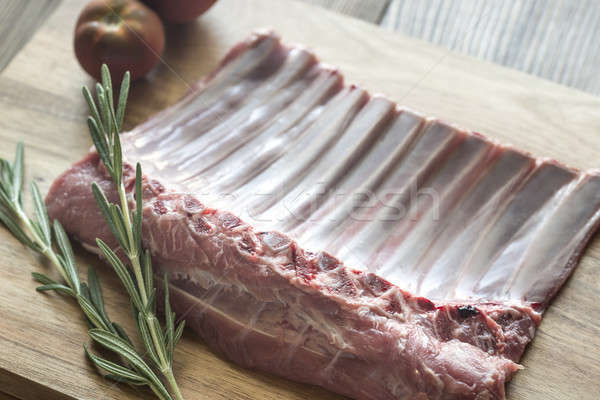 Raw lamb ribs with fresh rosemary Stock photo © Alex9500
