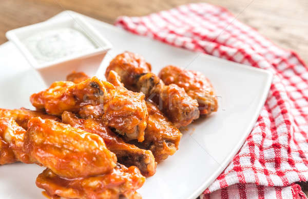 Portion of buffalo chicken wings Stock photo © Alex9500