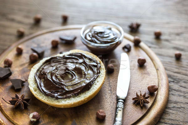 Seasame bun with chocolate cream and nuts Stock photo © Alex9500