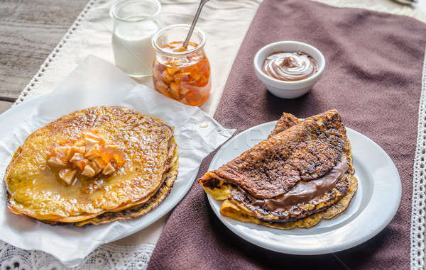 Pumpkin crepes with fruit confiture and chocolate cream Stock photo © Alex9500