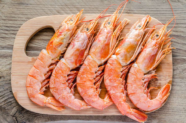 Shrimps on the wooden board Stock photo © Alex9500