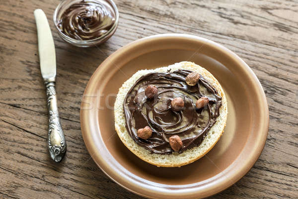 Seasame bun with chocolate cream and nuts Stock photo © Alex9500