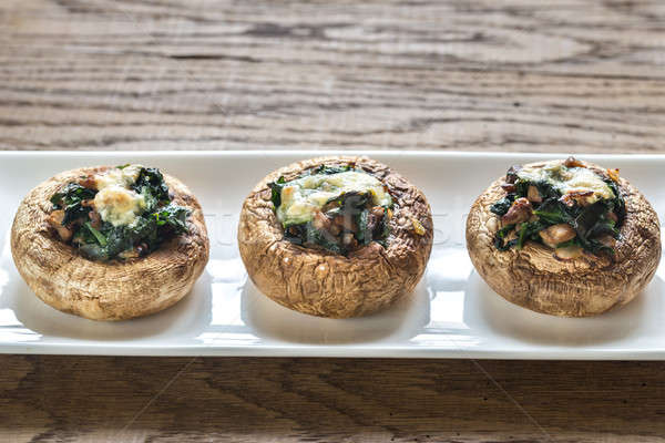 Baked mushrooms stuffed with spinach and cheese Stock photo © Alex9500