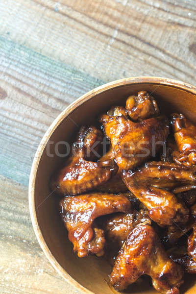 Bowl of teriyaki chicken wings Stock photo © Alex9500