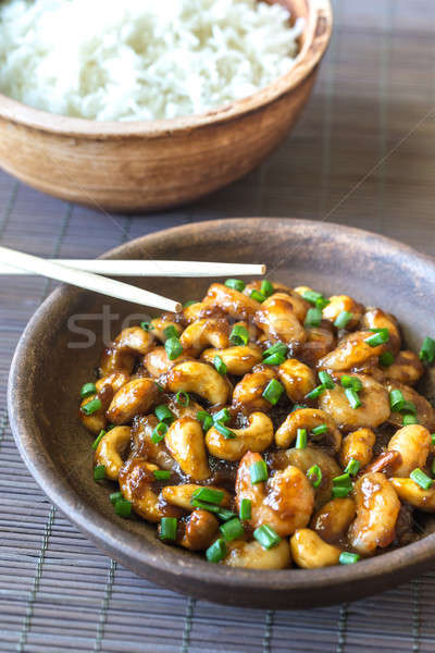 Portion of cashew shrimp stir-fry with rice Stock photo © Alex9500