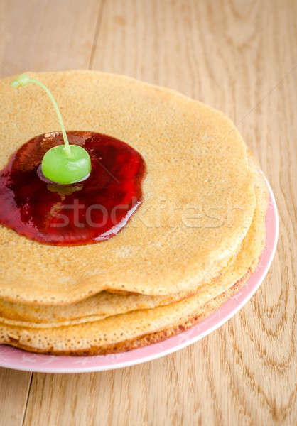 Crepes under cherry topping Stock photo © Alex9500