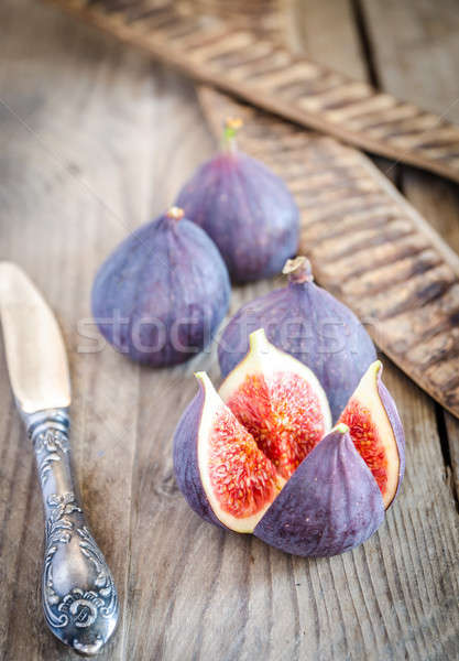 Ripe figs : cross section and whole fruits Stock photo © Alex9500