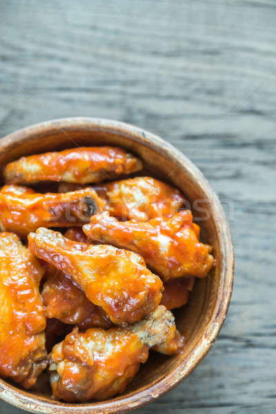 Bowl of buffalo chicken wings Stock photo © Alex9500