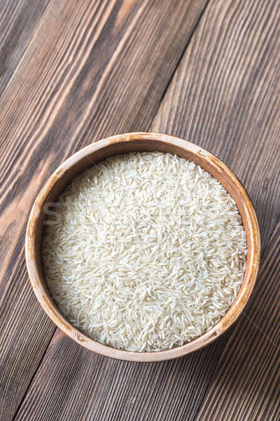 Bowls of uncooked camolino and basmati rice Stock photo © Alex9500