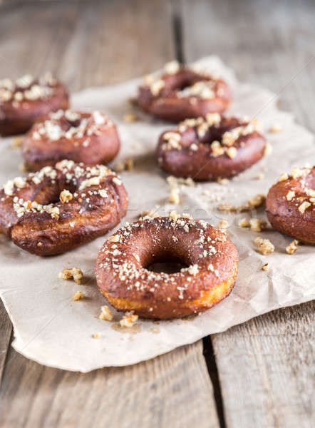 Donuts sprinkled with crushed nuts Stock photo © Alex9500