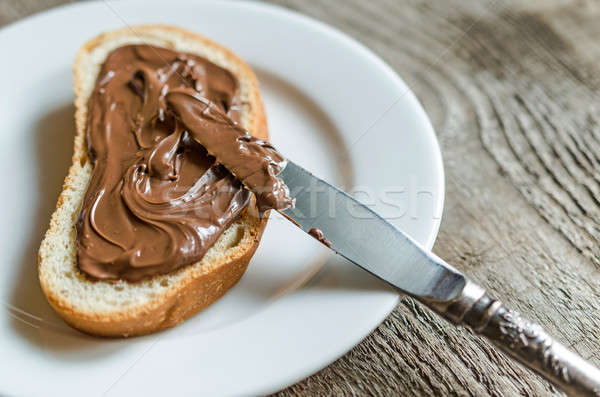 Slice of bread with chocolate cream Stock photo © Alex9500