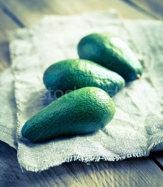 Avocado on the wooden table Stock photo © Alex9500