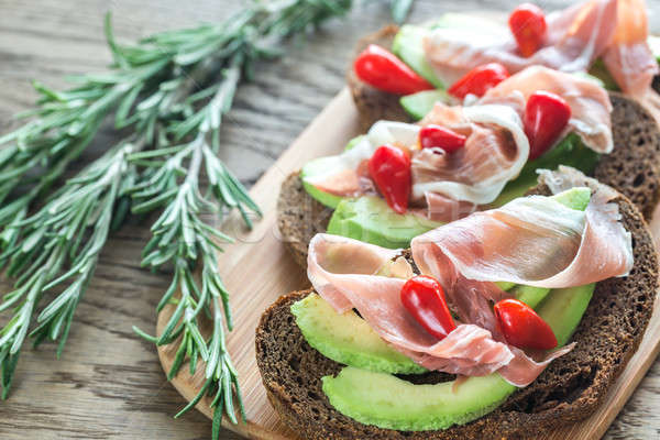 Sandwiches with avocado and prosciutto Stock photo © Alex9500