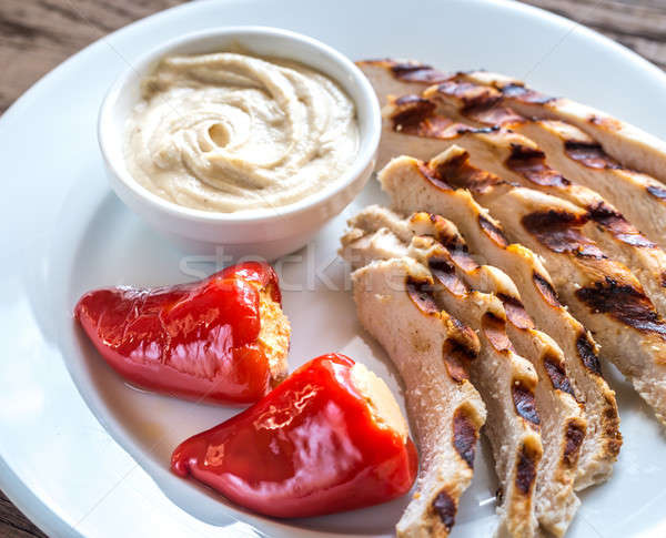 Grilled chicken with stuffed peppers and tahini sauce Stock photo © Alex9500