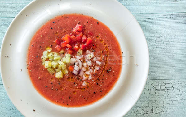 Portion of gazpacho on the wooden table Stock photo © Alex9500