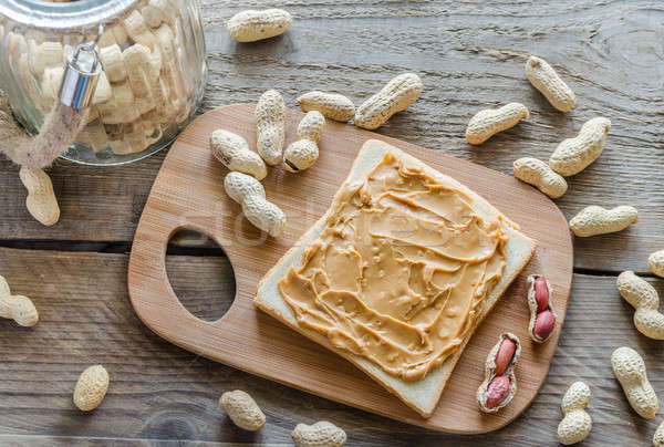 Stock photo: Sandwich with peanut butter on the wooden board