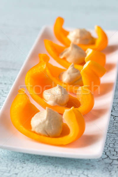 Slices of bell pepper with hummus Stock photo © Alex9500