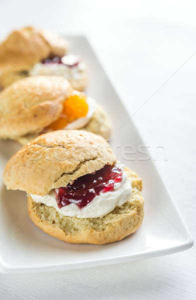 Scones with cream and fruit jam Stock photo © Alex9500