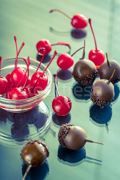Chocolate and cocktail cherries on the glass Stock photo © Alex9500