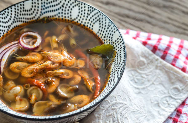 Bowl of thai tom yum soup Stock photo © Alex9500