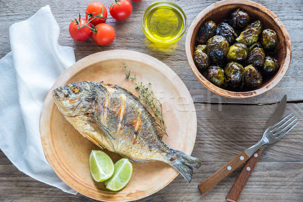Grilled Dorade Royale Fish with fresh and baked vegetables Stock photo © Alex9500