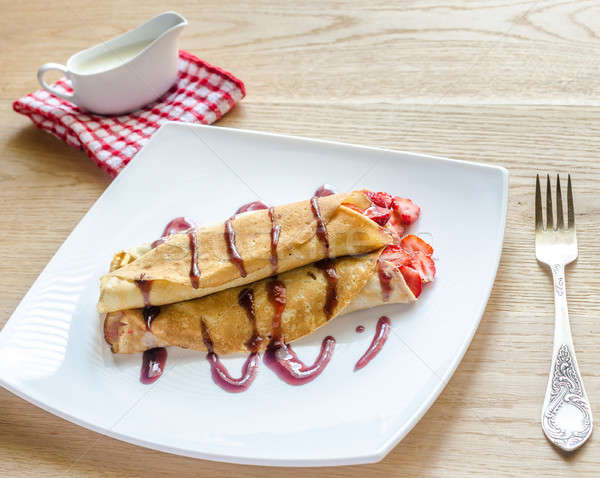 Stock photo: Crepes with fresh strawberries