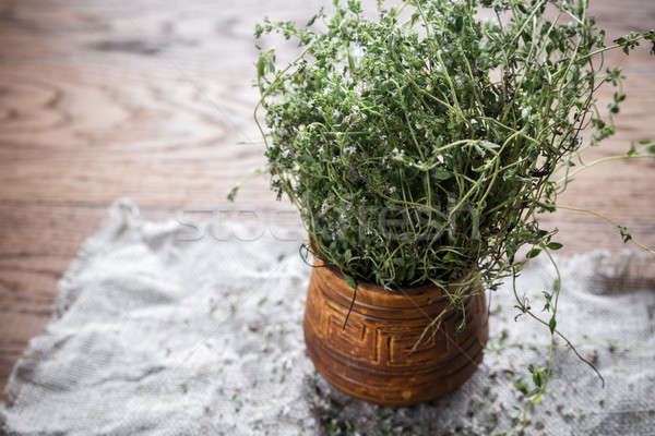 Fresh thyme on the wooden background Stock photo © Alex9500