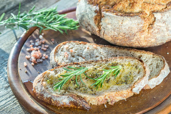 Slice of fresh bread with olive oil and herbs Stock photo © Alex9500
