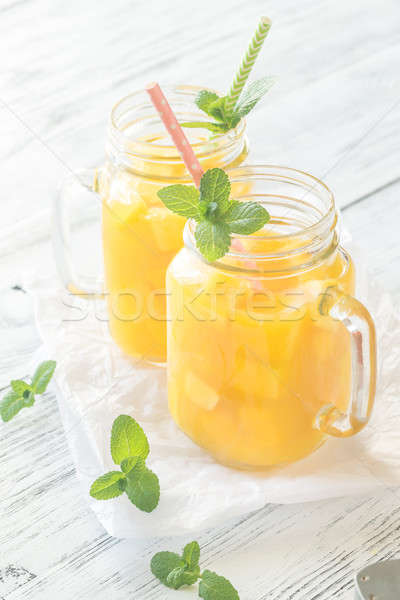 Mango juice in mason jars Stock photo © Alex9500