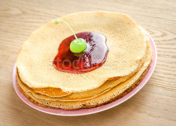Crepes under cherry topping Stock photo © Alex9500
