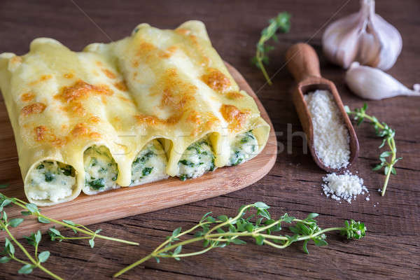 Cannelloni with ricotta and spinach on the wooden board Stock photo © Alex9500