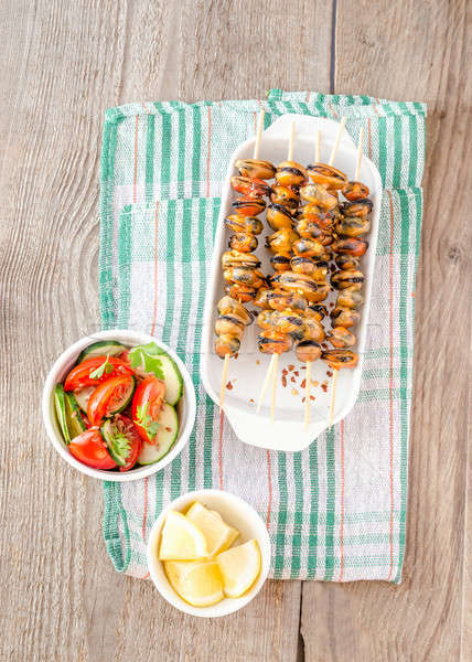 Mussel skewers with fresh salad Stock photo © Alex9500