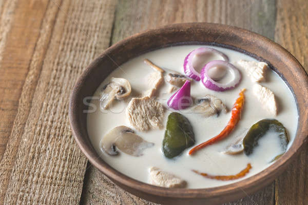 Bowl of thai tom kha kai soup Stock photo © Alex9500
