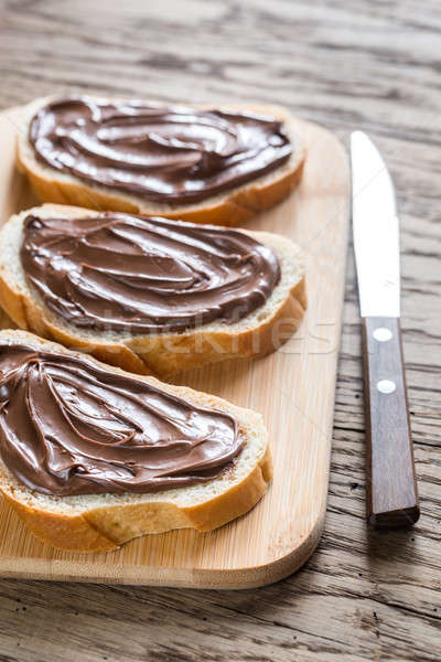 Slices of baguette with chocolate cream Stock photo © Alex9500