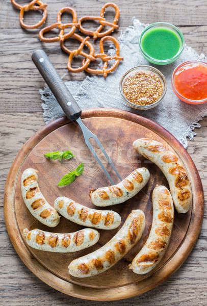 Grilled sausages with pretzels Stock photo © Alex9500