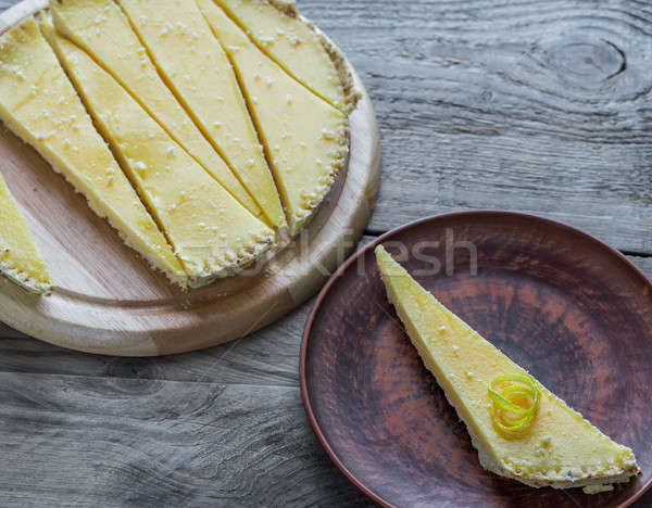 Foto stock: Porción · limón · tarta · placa · mesa · tenedor
