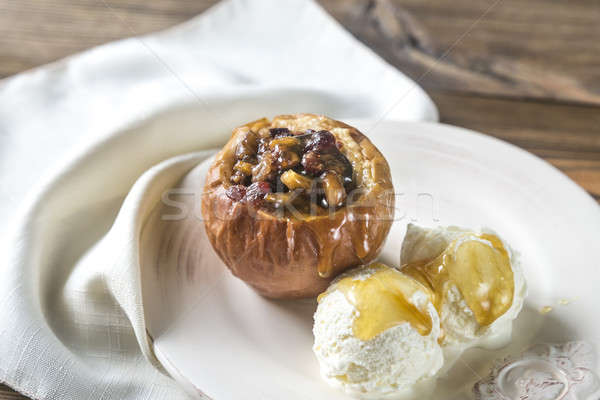 Stuffed baked apples on the plate Stock photo © Alex9500