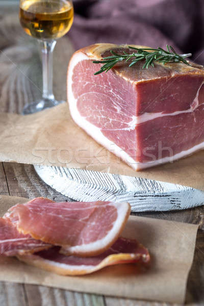 Prosciutto with fresh rosemary on the wooden board Stock photo © Alex9500