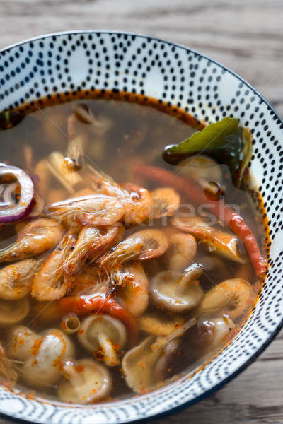 Bowl of thai tom yum soup Stock photo © Alex9500