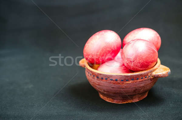 Colorful eggs in clay bowl Stock photo © Alex9500