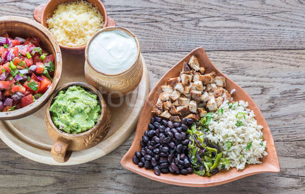 Chicken burrito bowl with the ingredients Stock photo © Alex9500
